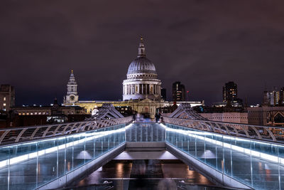 St paul's cathedral and millennium bridge over the river thames in london