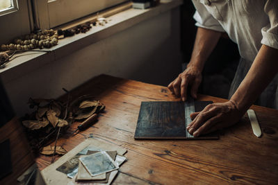 High angle view of man working on table