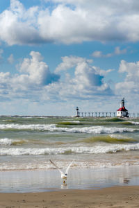 Active beach day at the light house in st joseph mi usa on lake michigan