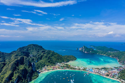 Scenic view of sea against blue sky