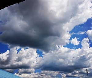 Low angle view of cloudscape against blue sky