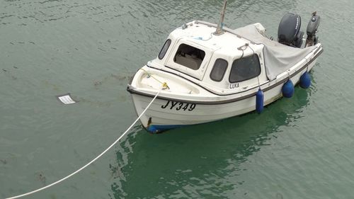 High angle view of boat sailing in sea