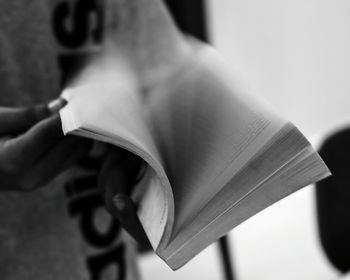 Close-up of cropped hand holding object