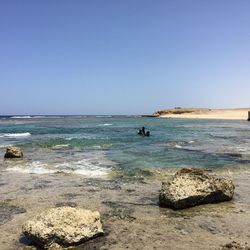 Scenic view of sea against clear sky