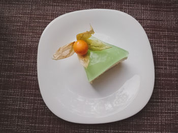 High angle view of fruit in plate on table