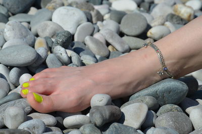 High angle view of pebbles on rocks