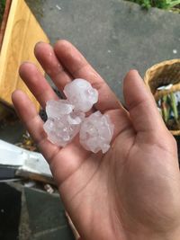 Close-up of hand holding ice cream