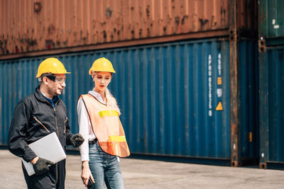 Man working with arms raised