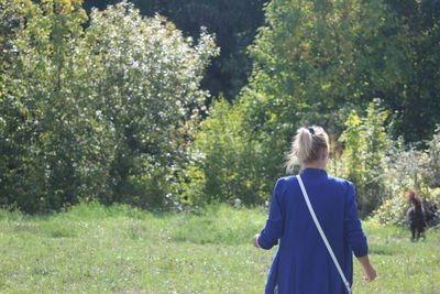 Rear view of woman in park