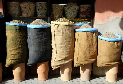 View of clothes for sale at market stall