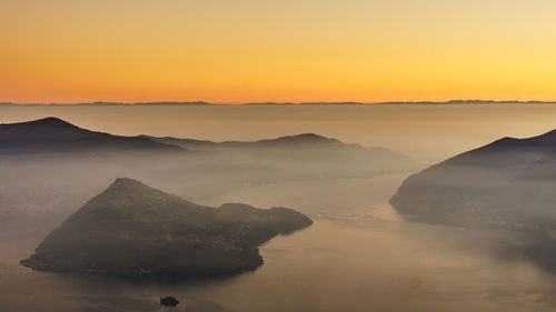 Scenic view of dramatic sky during sunset