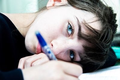 Close-up portrait of girl relaxing 