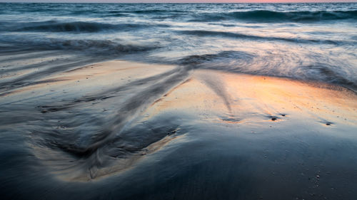 High angle view of surf on beach