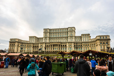 Group of people in front of building