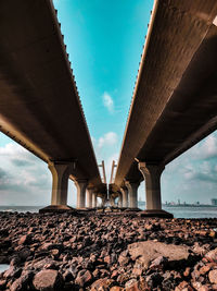 Low angle view of bridge against sky