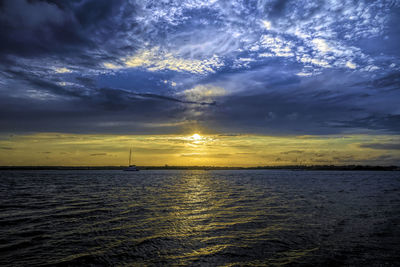 Scenic view of sea against sky during sunset