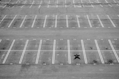 High angle view of man in parking lot