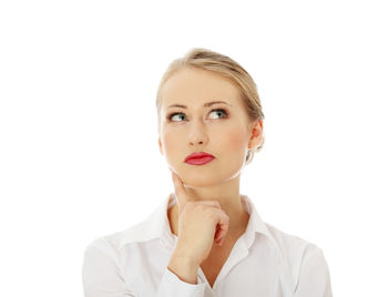Portrait of a beautiful young woman over white background