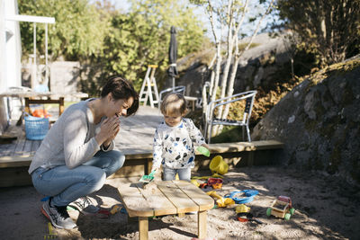 Father and son sitting in traditional clothing