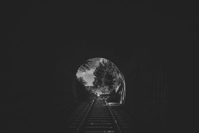 Railroad tracks in tunnel