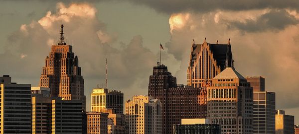 Buildings in city against sky