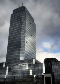 Low angle view of modern buildings against sky