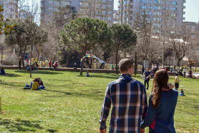 Rear view of people in park