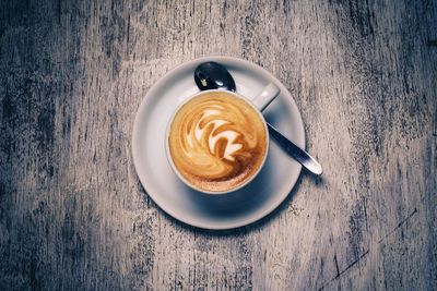 High angle view of cappuccino on table