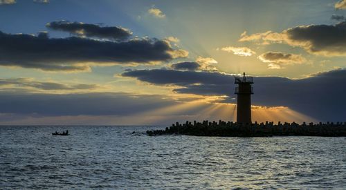 Scenic view of sea at sunset