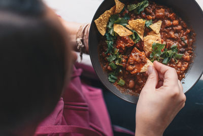 Woman eating mexican food