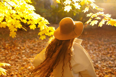 Rear view of woman wearing hat