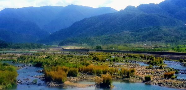 Scenic view of lake and mountains