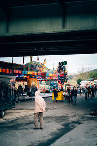 People walking on street market