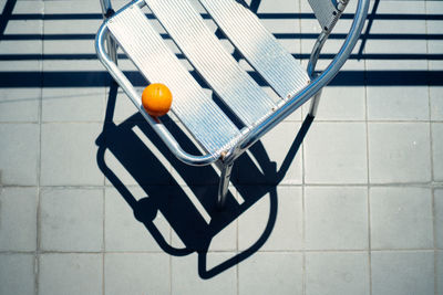 Close-up of orange on chair