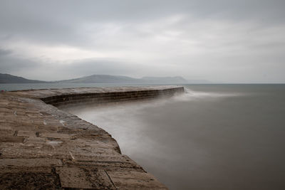 Long exposure of lyme regis pier in dorset