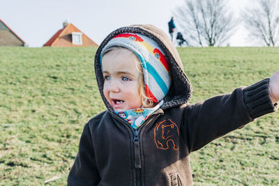 Portrait of boy in field