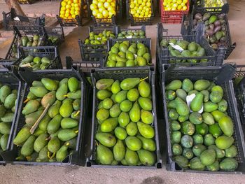 High angle view of fruits for sale at market stall