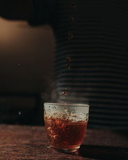 Close-up of beer glass on table