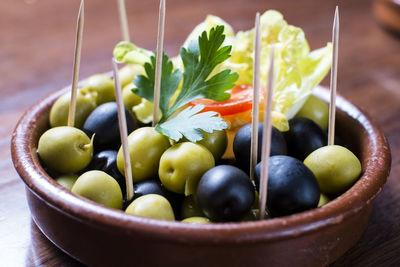 Close-up of fruits in bowl on table