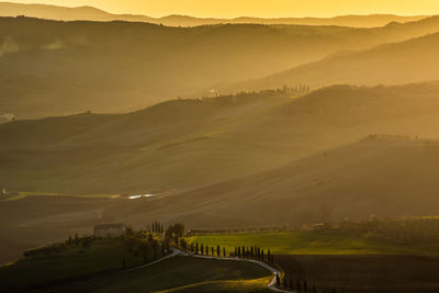 Scenic view of landscape against sky during sunset