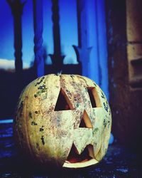 Close-up of pumpkin on rusty metal