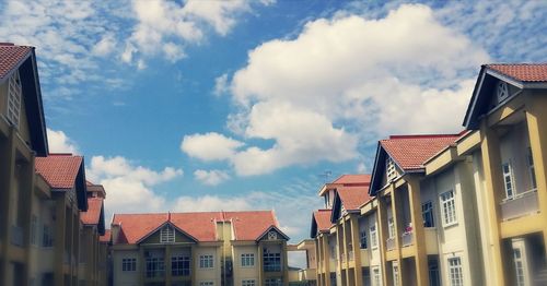 Low angle view of houses against sky