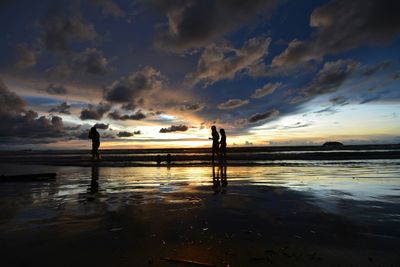 Scenic view of sea at sunset