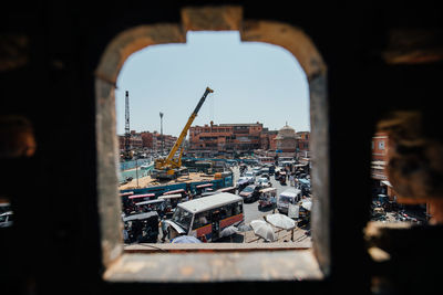 Buildings in city seen through window