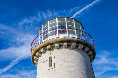 Low angle view of built structure against blue sky