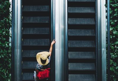 High angle view of person on escalator