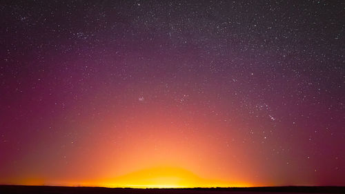 Scenic view of sea against sky at night