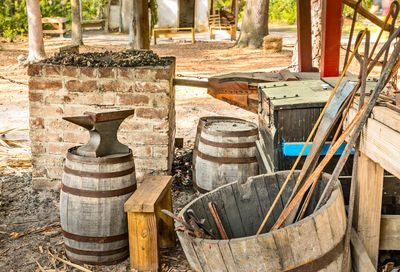 View of old bottles on wooden structure