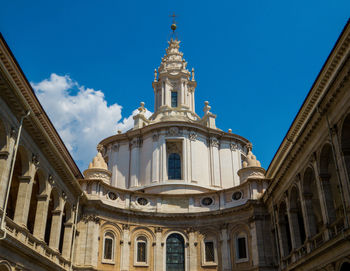 Low angle view of building against blue sky