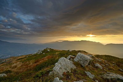 Scenic view of mountains against sky during sunset